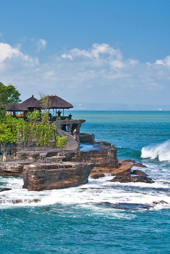 Tanah Lot Temple (Indonesian_ Pura Tanah Lot) is…